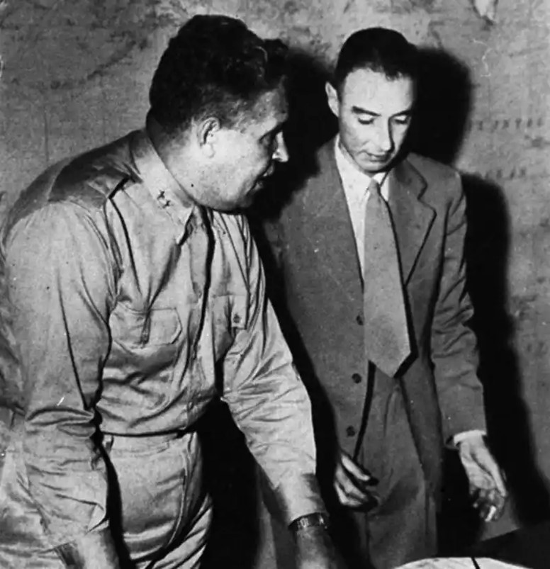 Gen. Leslie Groves, and J. Robert Oppenheimer. Circa 1944.